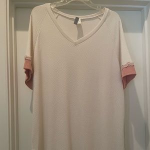 Ladies cream, V-Neck blouse by honey me curvy. Size 2XL.